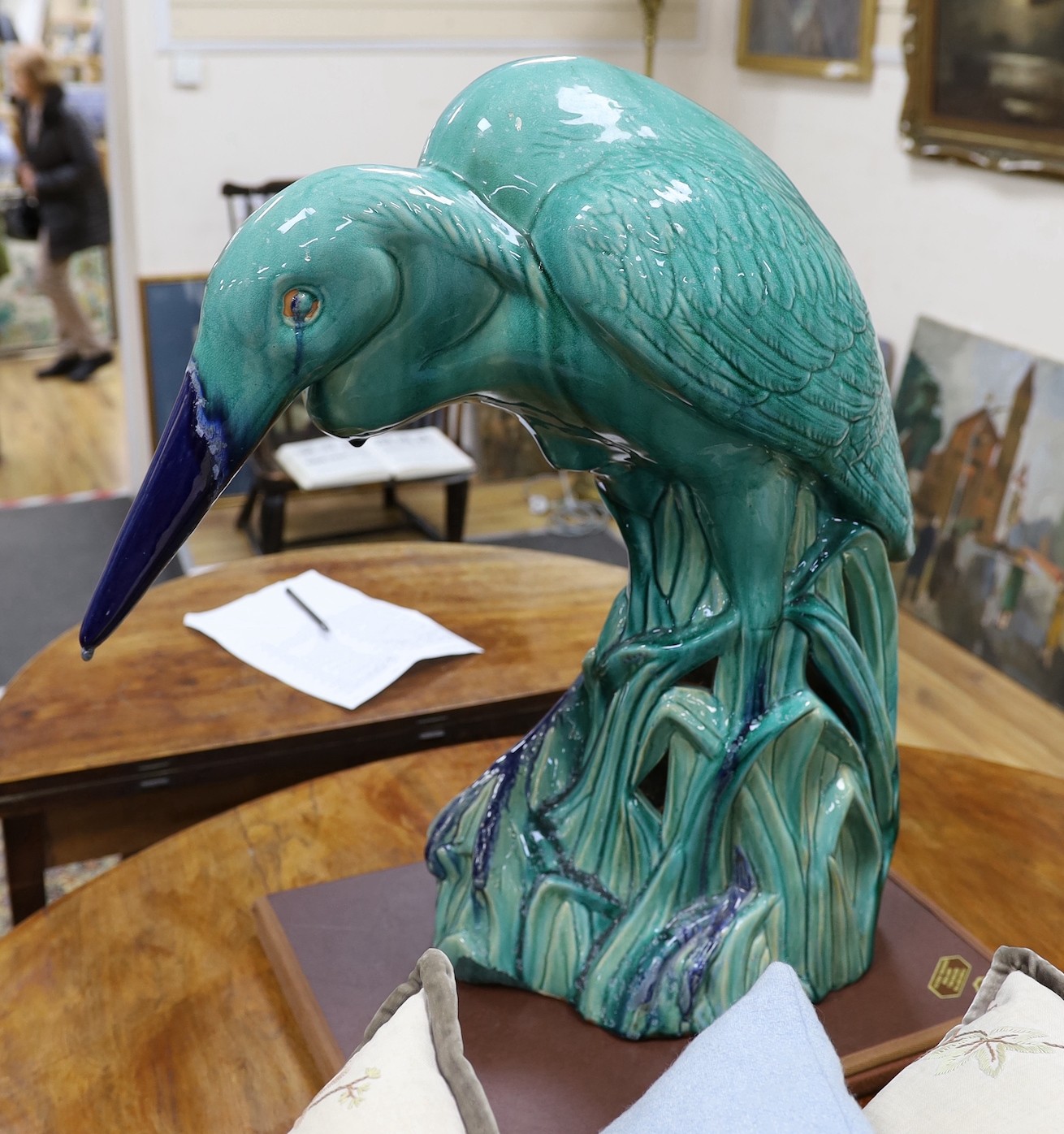 A large Chinese Shiwan style model of a heron, 66cm tall